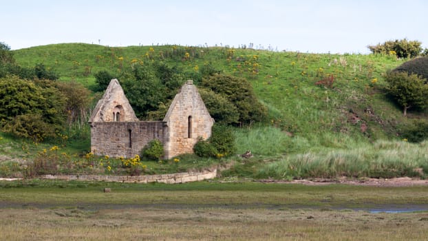 ALNMOUTH NORTHUMBERLAND/UK - AUGUST 14 : Ruins of Mortuary Chapel on the West Side of Church Hill in Alnmouth Northumberland on August 14, 2010