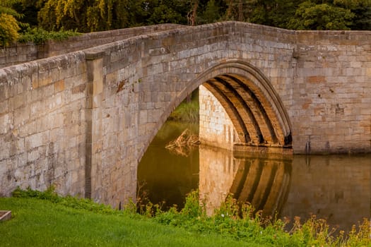 LESBURY NORTHUMBERLAND/UK - AUGUST 14 : The Old Mill Bridge at Lesbury Northumberland on August 14, 2010