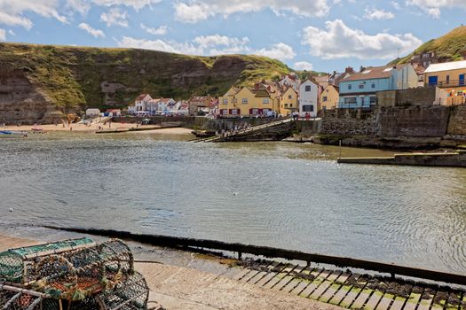 STAITHES, NORTH YORKSHIRE/UK - AUGUST 21 : View of Staithes Harbour North Yorkshire on August 21, 2010. Unidentified people