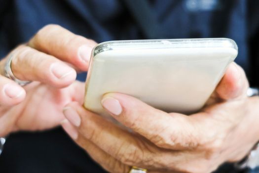 close up image of man hand using mobile phone, communication background, telecommunication,mobile internet