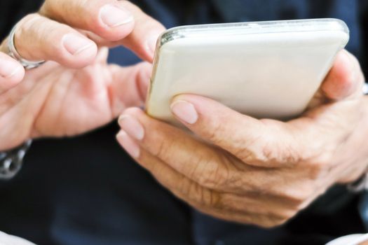 close up image of man hand using mobile phone, communication background, telecommunication,mobile internet