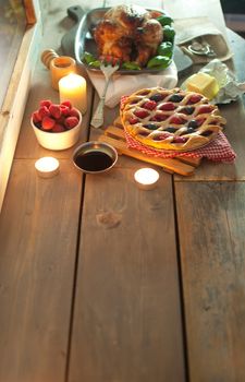 Xmas food spread on a wooden table with space 