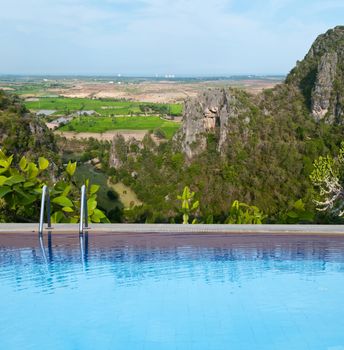 Outdoor swimming pool with view point on top of mountain