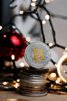 Crypto currency physical metal bitcoin coin. Digital currency christmas concept.