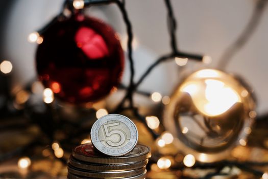 Physical gold and silver polish money coin. Christmas concept.