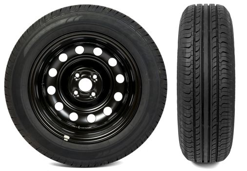 Set of two new black tyres isolated on white background