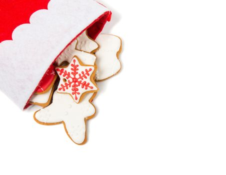 Christmas concept. Christmas sock with gingerbread on white background