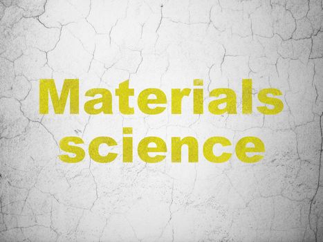 Science concept: Yellow Materials Science on textured concrete wall background