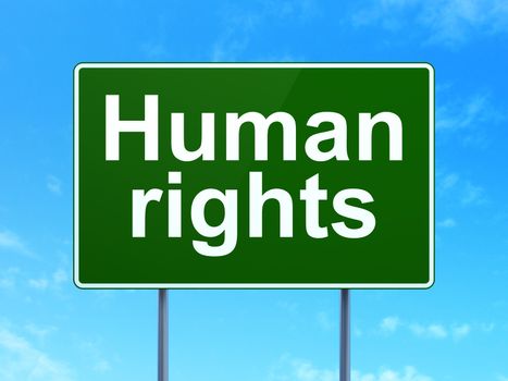 Political concept: Human Rights on green road highway sign, clear blue sky background, 3D rendering