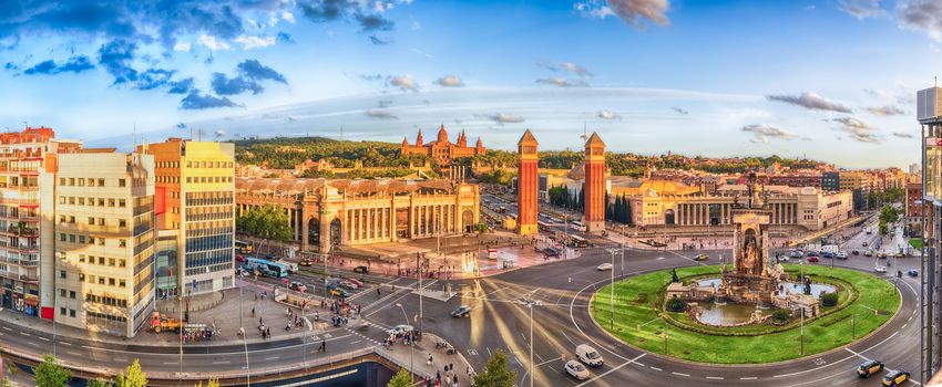 Panoramic view of Placa d'Espanya, towards Venetian Towers and National Art Museum. This iconic square is located at the foot of Montjuic and it's a major landmark in Barcelona, Catalonia, Spain