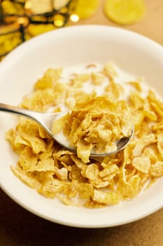 Delicious and fresh corn flakes in white bowl. Christmas food concept.