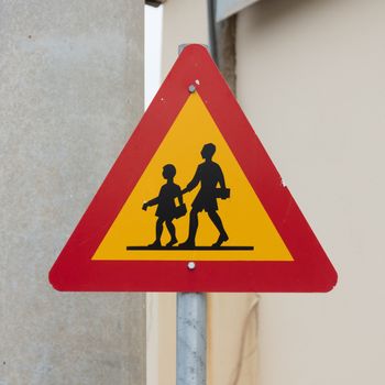 Iceland: warning sign of children crossing street from school