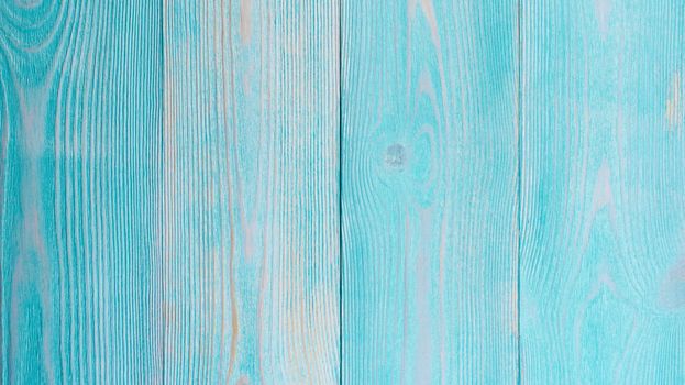 Stain Knot Turquoise and Beige Wooden Background closeup