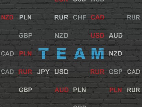 Business concept: Painted blue text Team on Black Brick wall background with Currency