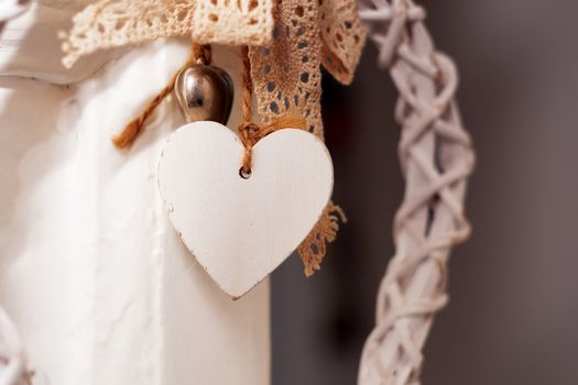 white wooden heart hanging