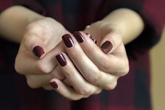 Close up of giving female hands . Shallow depth of field with focus on the hands.