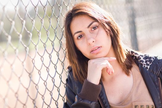 Beautiful Meloncholy Mixed Race Young Woman Portrait Outside.