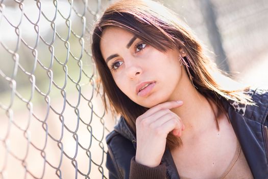 Beautiful Meloncholy Mixed Race Young Woman Portrait Outside.