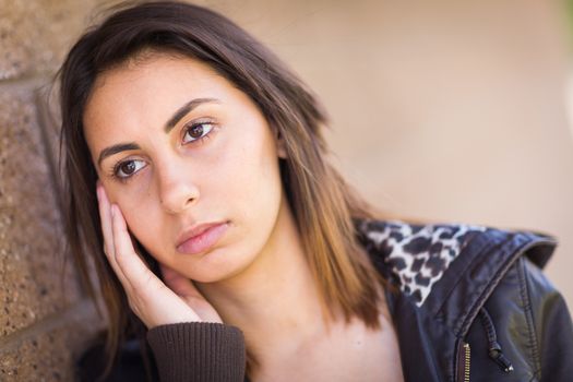 Beautiful Meloncholy Mixed Race Young Woman Portrait Outside.