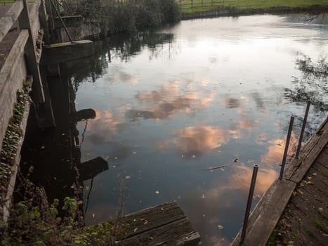 beautiful lake surface clouds reflection empty space water; essex; england; uk
