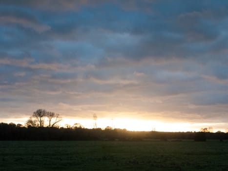 beautiful empty landscape background clouds autumn grass field meadow; essex; england; uk