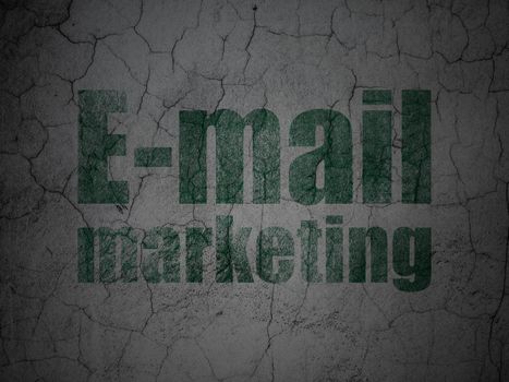 Marketing concept: Green E-mail Marketing on grunge textured concrete wall background