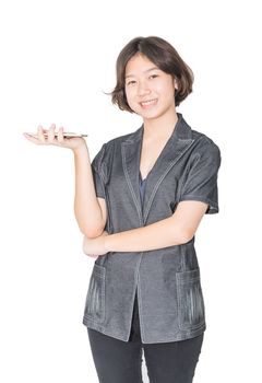 Asian women stand with using mobile phone isolated over white background