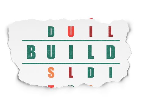 Building construction concept: Painted green word Build in solving Crossword Puzzle on Torn Paper background