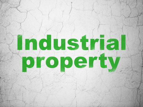 Law concept: Green Industrial Property on textured concrete wall background