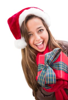 Girl Wearing A Christmas Santa Hat with Bow Wrapped Gift Isolated on White.