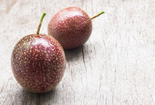 Closeup passion fruit on wooden background, fruit healthy concept