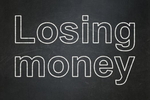 Banking concept: text Losing Money on Black chalkboard background