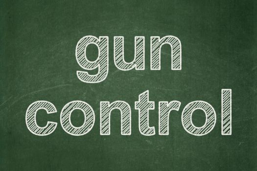 Security concept: text Gun Control on Green chalkboard background