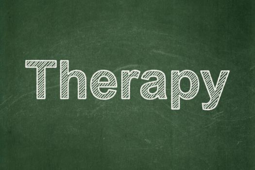 Healthcare concept: text Therapy on Green chalkboard background