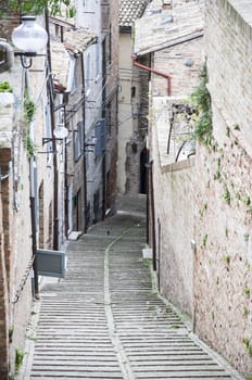 A small street in the old town of Urbino, Italy