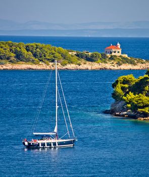 Island of Vis bay entrance and lighthouse view, sailing destination in Dalmatia archipelago of Croatia
