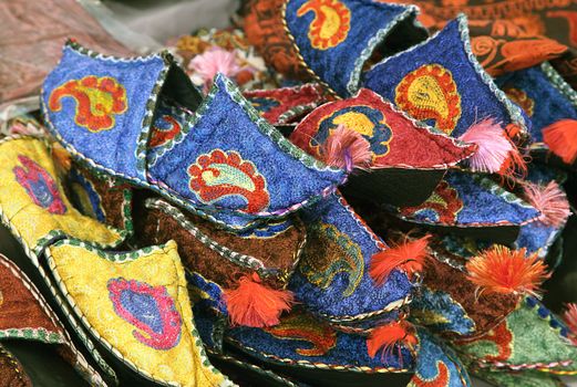 Colorful Uzbek traditional slippers at a market