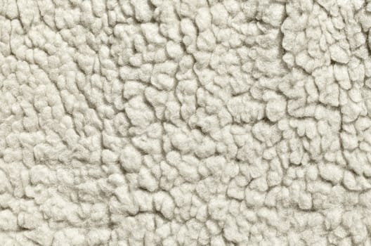 Macro shot of white felted wool for texture or background