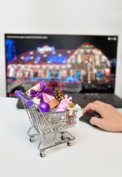 Online Christmas Shopping Cart on desk