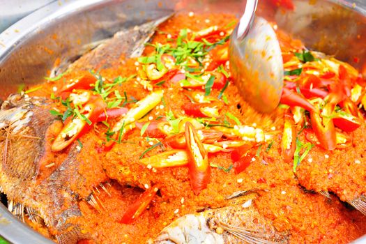 Fried fish topped with chilli sauce, Thai food.