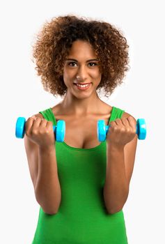 Beautiful African American woman lifting weights 