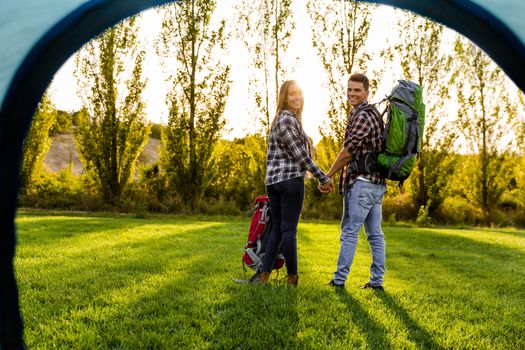 Shot of a young couple with backpacks ready for camping