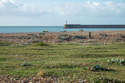 Shore and lighthouse from Tide Mills at Newhaven