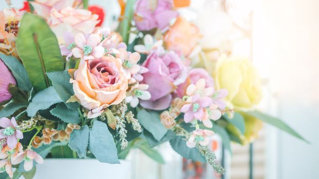 colorful of the plastic flowers bouquet  , soft of focus