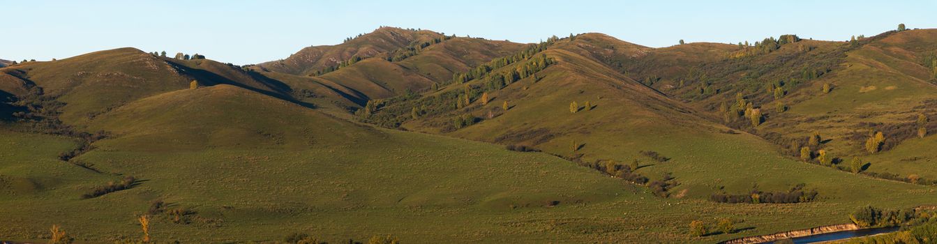 Beauty summer evening in the mountains in Altay, panoramic picture