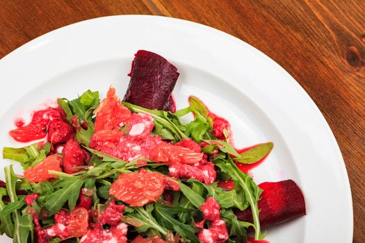 Closeup shot of a plate full of a salad