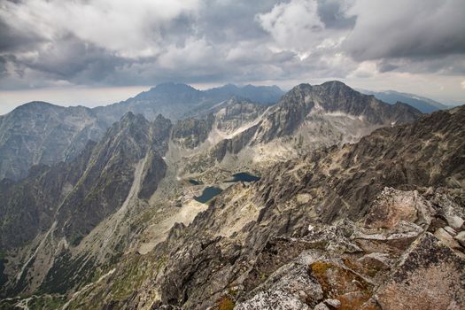 Photo of five lakes valley in High Tatra mountains. Dolina Pieciu Stawow Spiskich, view from Lomnicky Stit.