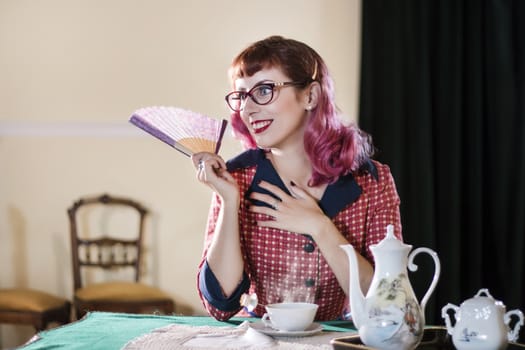 Vintage themed tea girl on a old retro house.