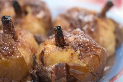 Oven baked apples with cinnamon, sugar honey and red wine.