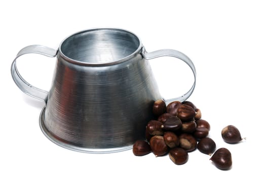 Close view of a metal rustic chestnut roaster isolated on a white background.